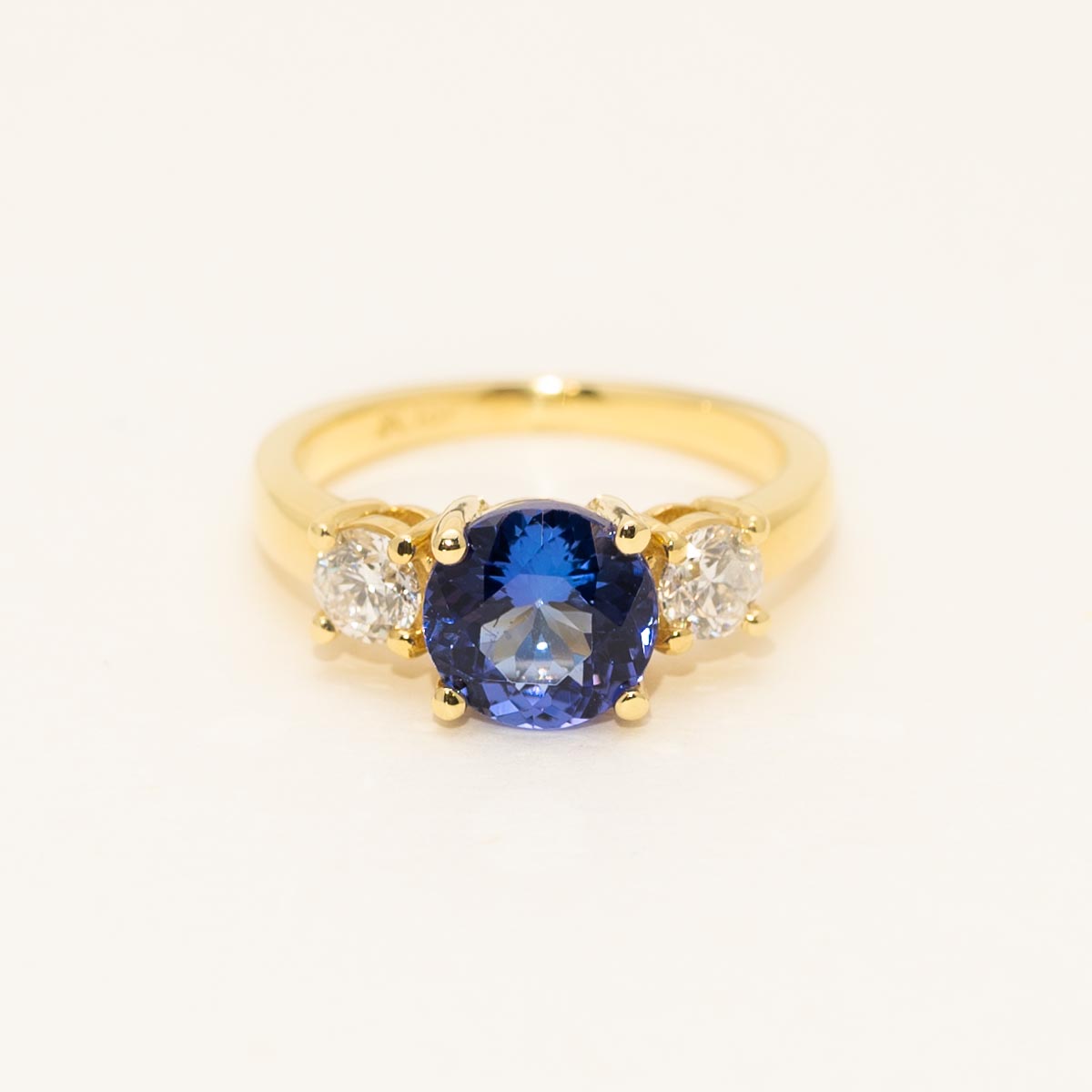 Gold 5 tanzanite and diamond chips store ring