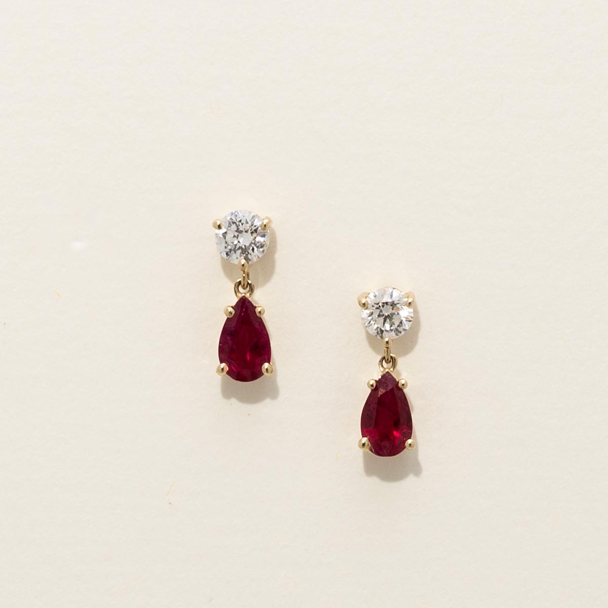 Pear Shape Ruby Drop Earrings in 14kt Yellow Gold with Diamonds (1/5ct tw)