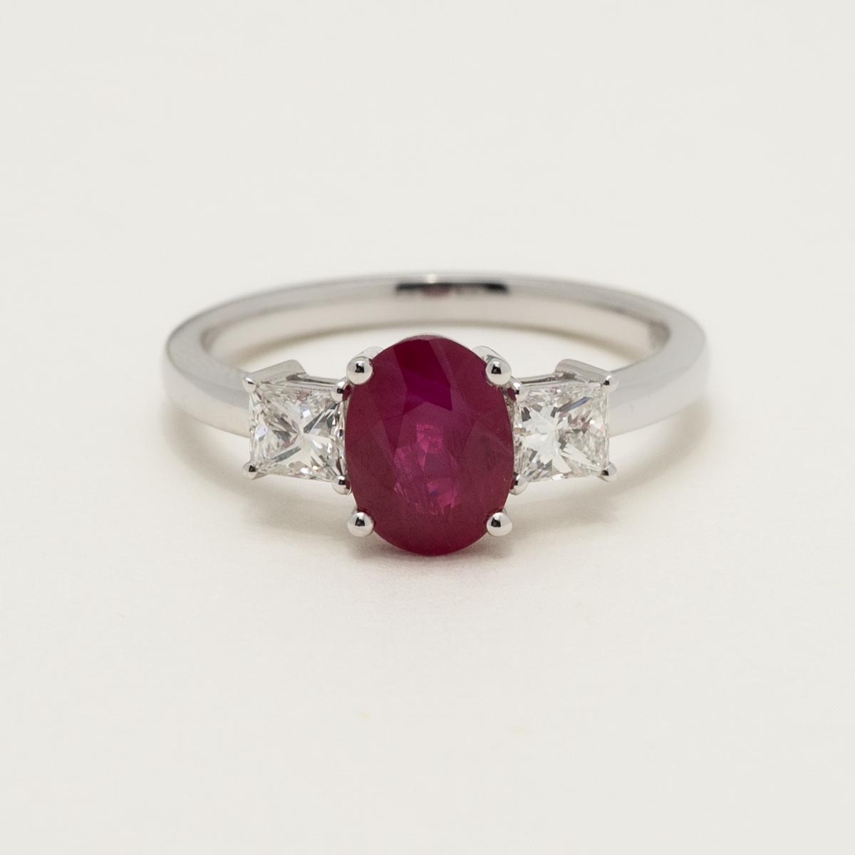 Oval Ruby Ring in 14kt White Gold with Princess Cut Diamonds (1/2ct tw)