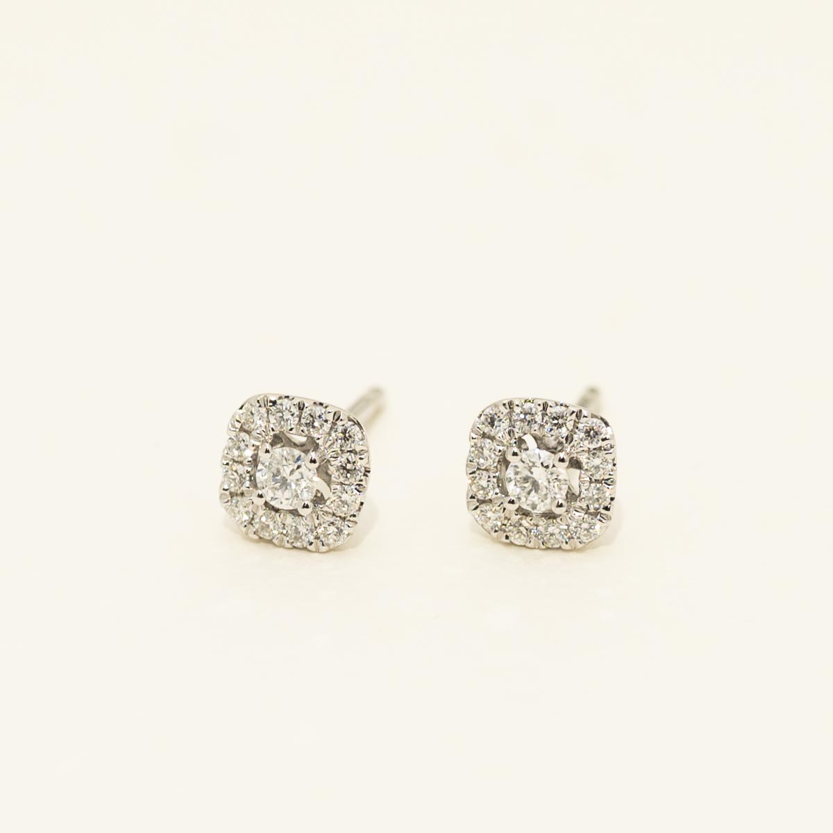 Diamond Halo Earrings in 14kt White Gold (1/4ct tw)