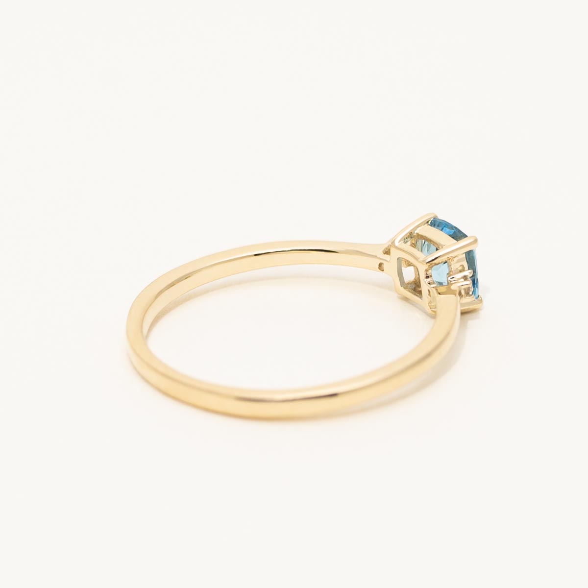 Cushion Cut Swiss Blue Topaz Ring in 10kt Yellow Gold with Diamonds (.02ct tw)