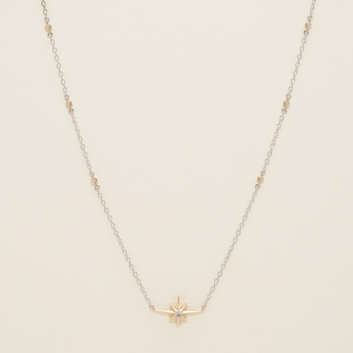 Northern Star Diamond Celestial Station Necklace in Sterling Silver and 10kt Yellow Gold (1/20ct tw)