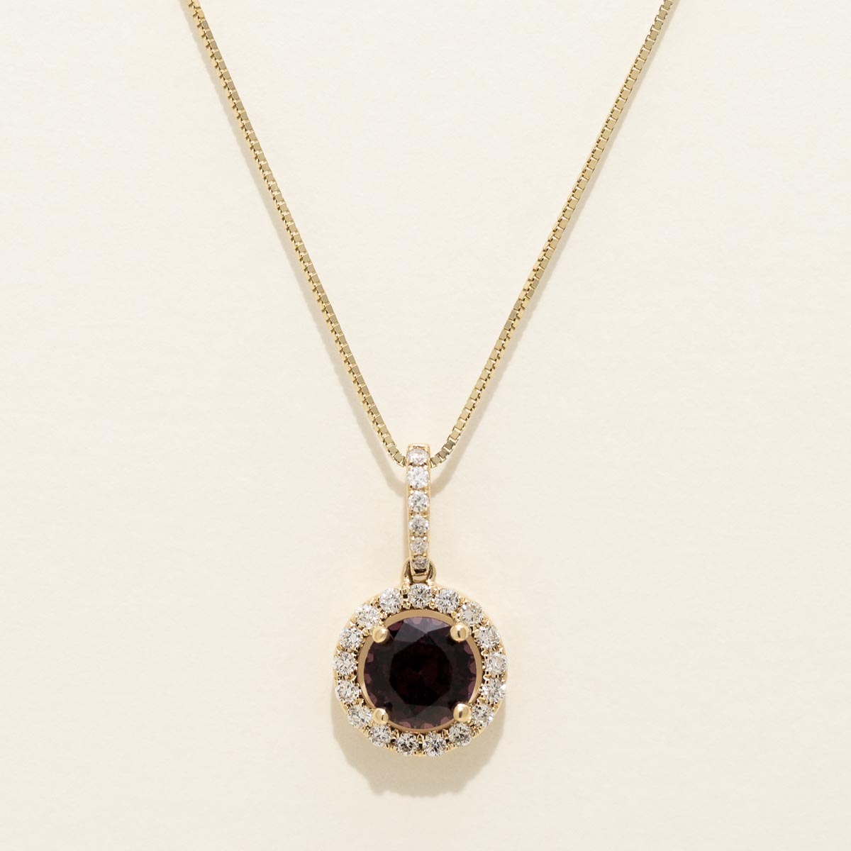 Purple Spinel Halo Necklace in 14kt Yellow Gold with Diamonds (1/7ct tw)