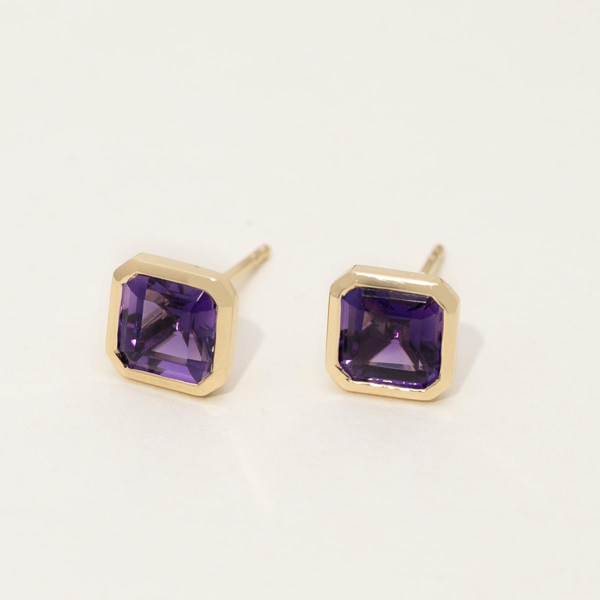 Asscher Cut Amethyst Bezel Stud Earrings in 14kt Yellow Gold