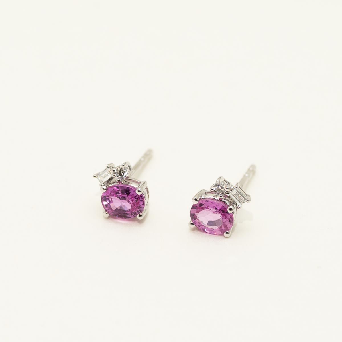 Oval Pink Sapphire Stud Earrings in 14kt White Gold with Diamonds (1/20ct tw)