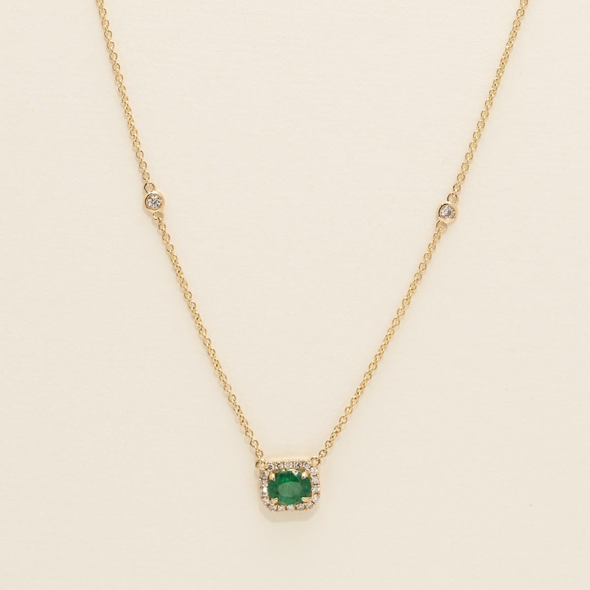 Oval Emerald Necklace in 14kt Yellow Gold with Diamonds (1/7ct tw)