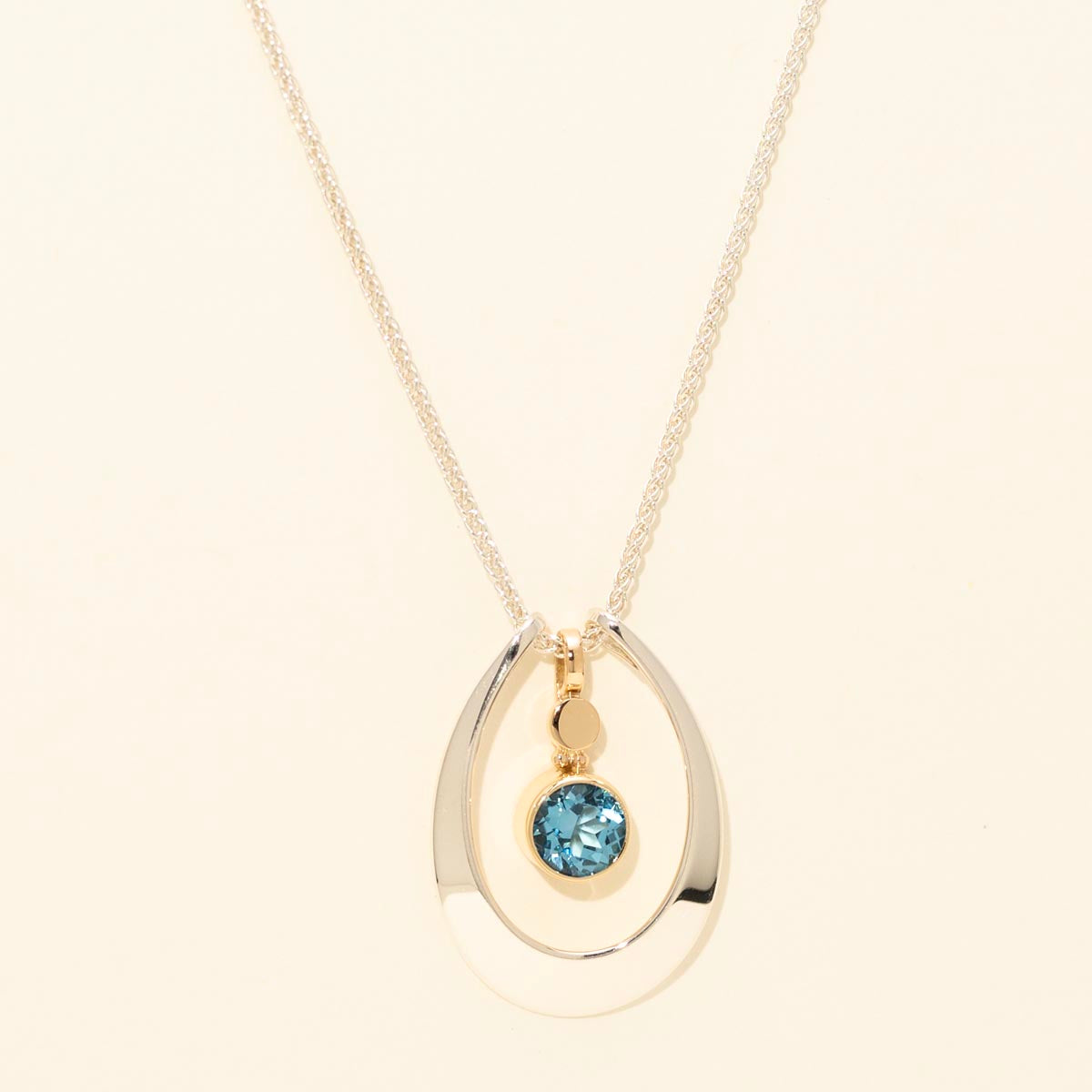 E.L. Designs Caprice Blue Topaz Necklace in Sterling Silver with 14Kt Yellow Gold