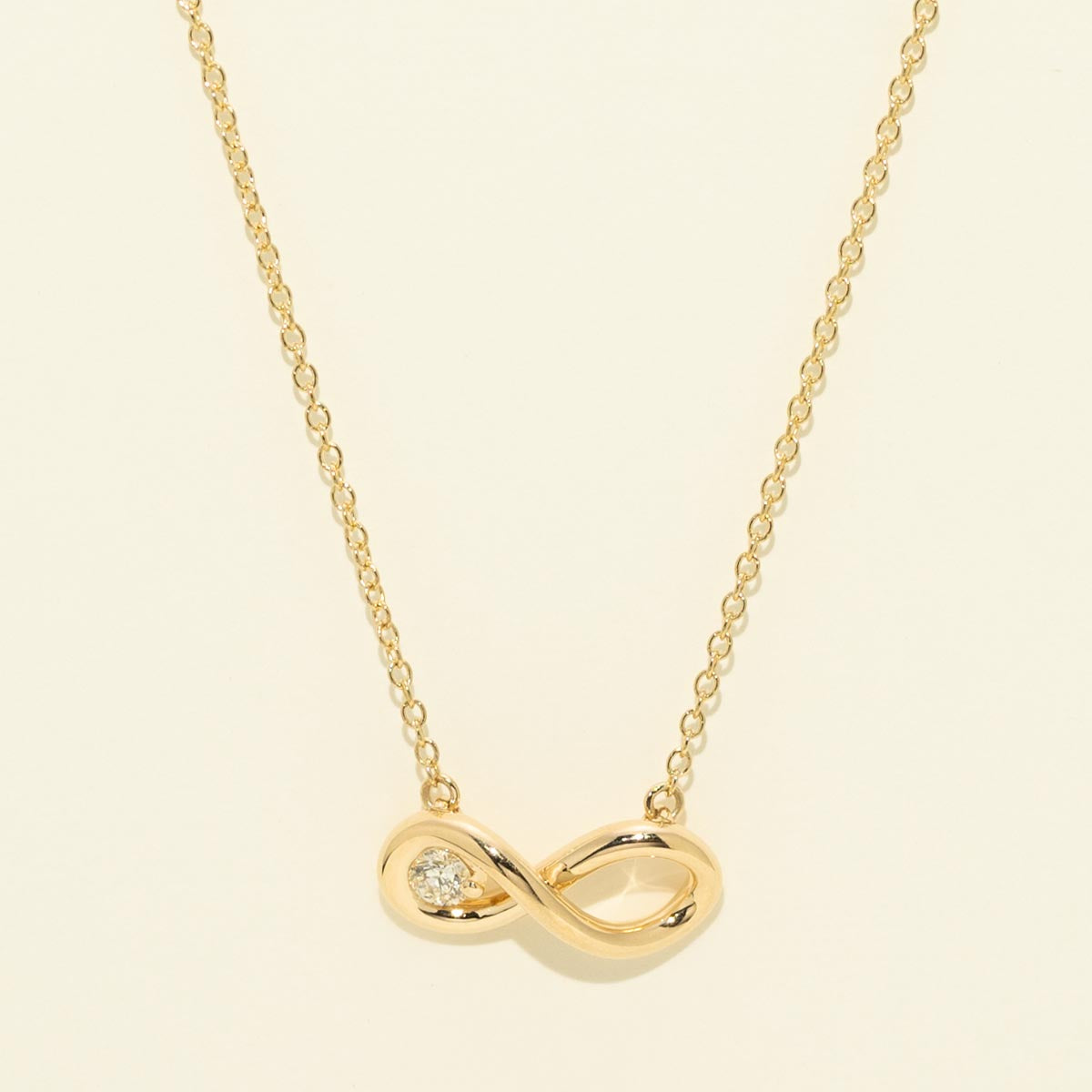 Northern Star Love Knot Infinity Necklace in 10kt Yellow Gold (1/10ct)