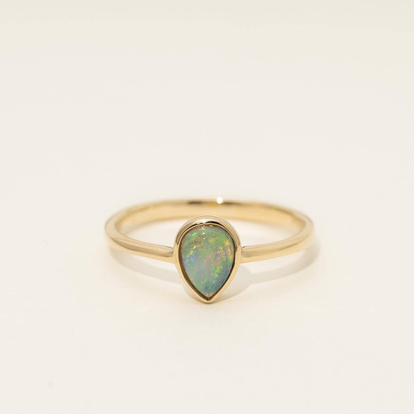 Parlé Pear Shape Australian Opal Bezel Ring in 14kt Yellow Gold