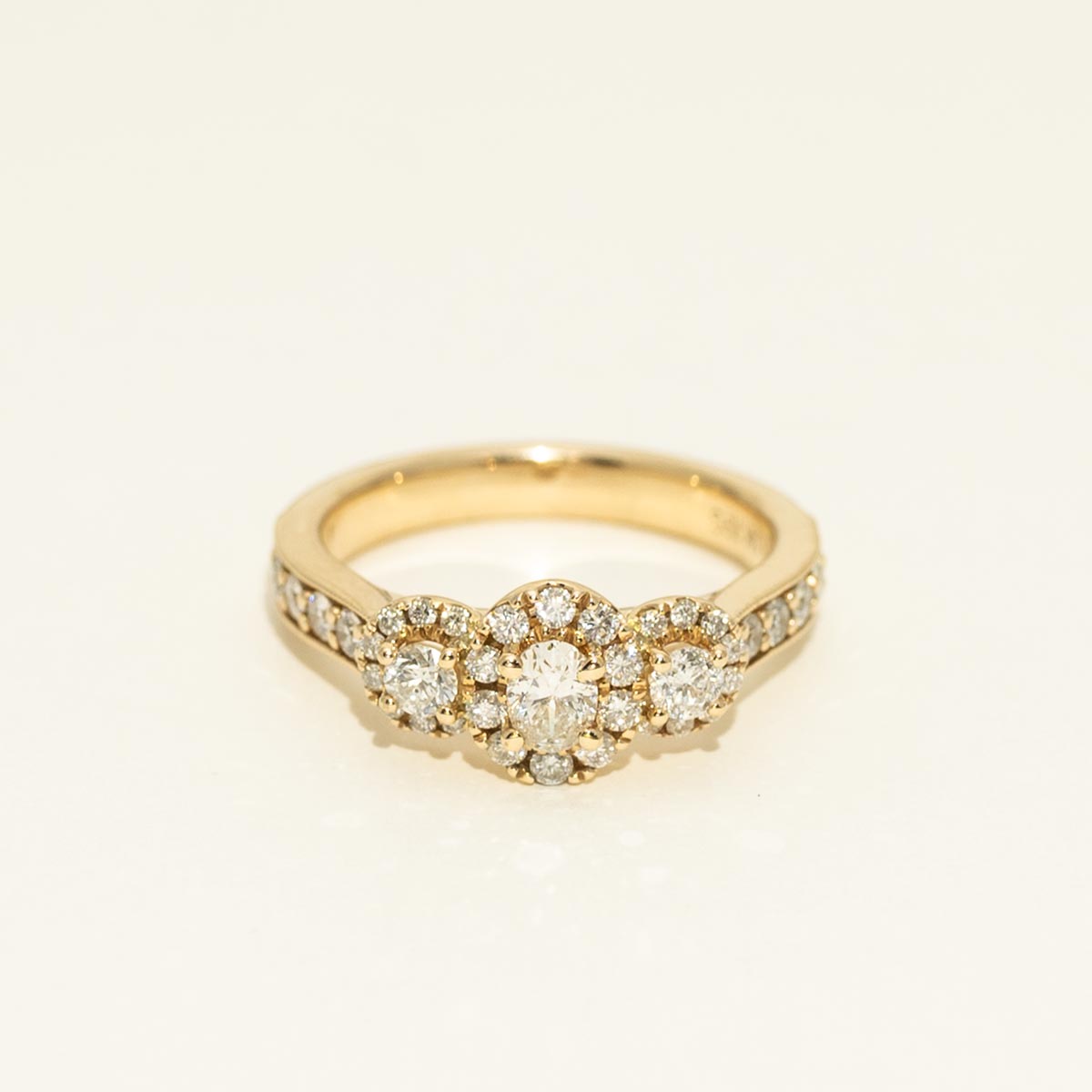 Oval Diamond Three Stone Halo Engagement Ring in 14kt Yellow Gold (1ct tw)